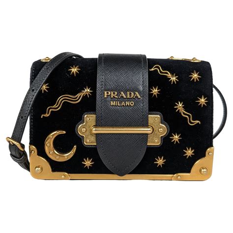 prada cahier bag moon stars